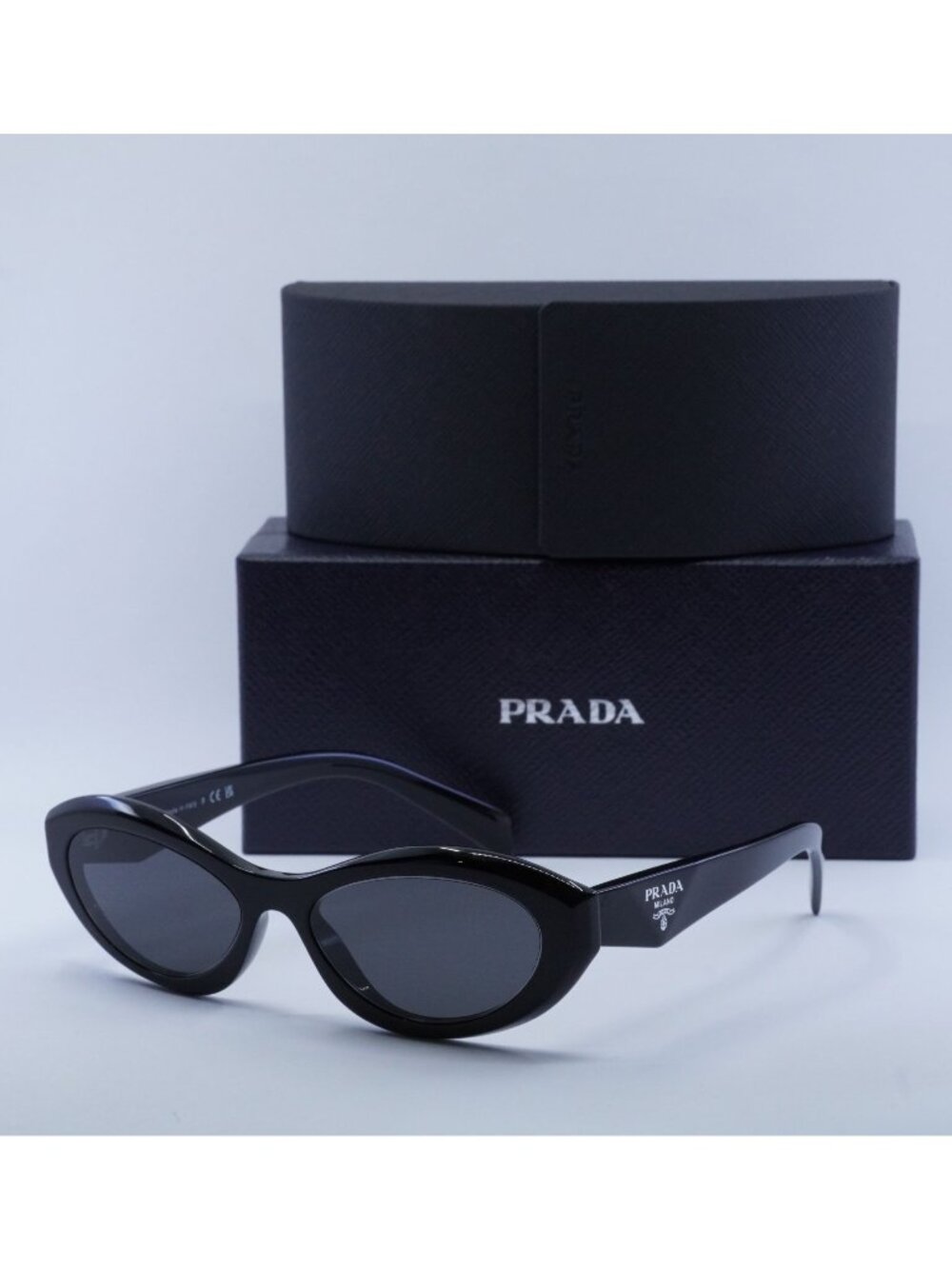 Prada PR26ZS 16K08Z Oval Sunglasses – Black\Dark Grey